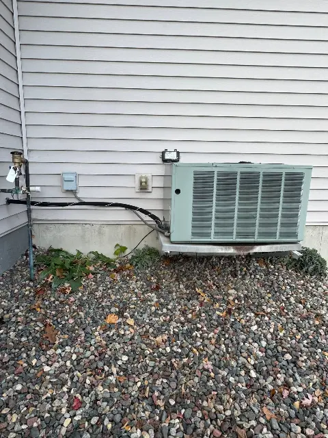Installed air conditioning unit outside a home in Maple Grove, MN